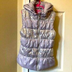 NWOT front zipper vest with hoodie. Sequin details a add a touch of texture
